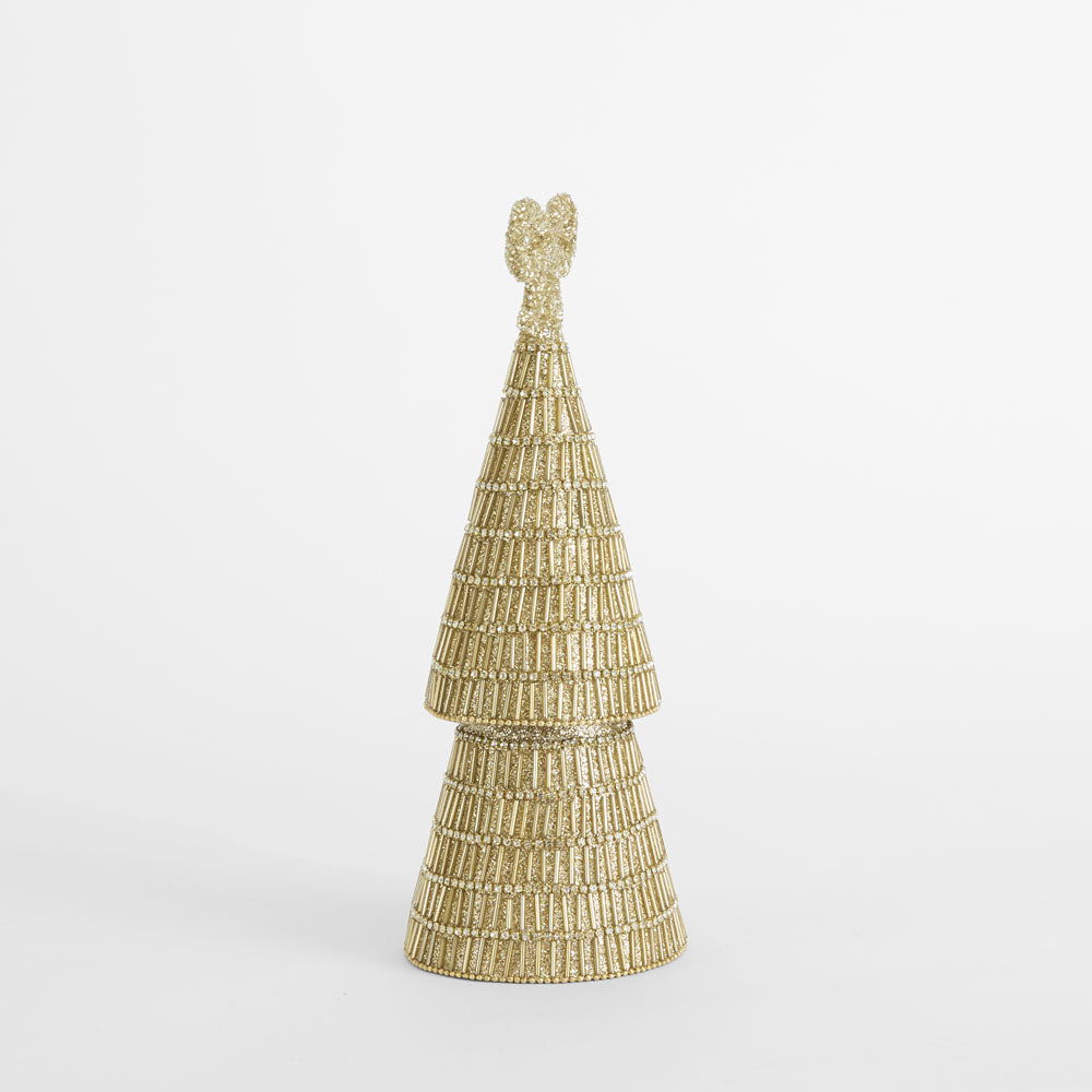 A small decorative Christmas tree sculpture covered in textured gold beads, featuring a tiered cone shape and a heart-shaped ornament on top, set against a plain white background.